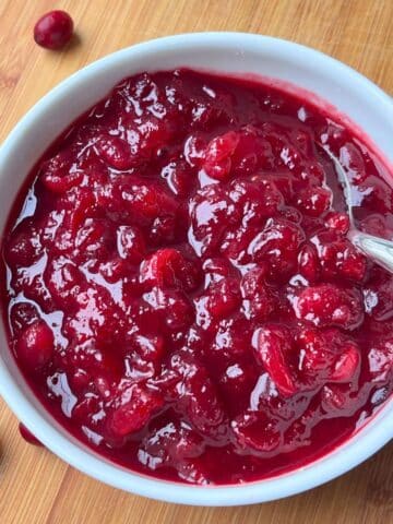 cranberry sauce prepared and in a white bowl.
