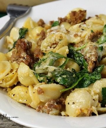 sausage orechiette casserole plated with fork