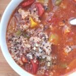 close up of complete soup in white bowl.