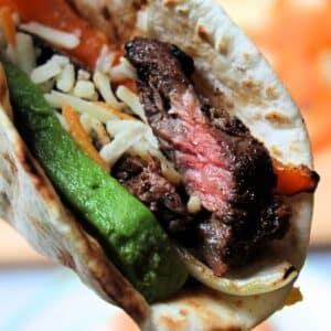 Close up of an assembled beef fajita.