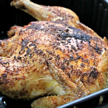 air fryer whole chicken cooked in basket