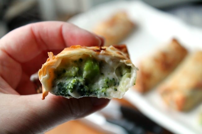 broccoli cheese egg roll close up in half