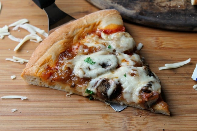 slice caramelized onion and mushroom pizza