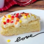 up close shot of sugar cookie bar on white plate