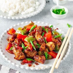 black pepper chicken cooked in a white bowl