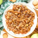 Close up, overhead view of the prepared apple pie dip in a white serving dish.