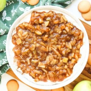 Close up, overhead view of the prepared apple pie dip in a white serving dish.
