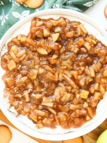 Close up, overhead view of the prepared apple pie dip in a white serving dish.